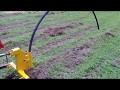 Implements Direct Single tine ripper with pipe laying attachment demo