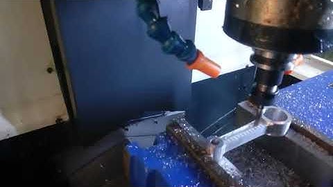 Slot making by CNC vertical milling on connecting rod.