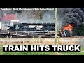 Fiery train vs truck