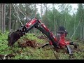 ATV backhoe removing stumps and topsoil
