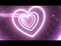 Pretty pink love heart tunnel curved path beautiful neon glow lights 4k effects background