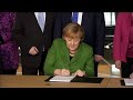 Germany: Angela Merkel signs coalition agreement with Social Democrats