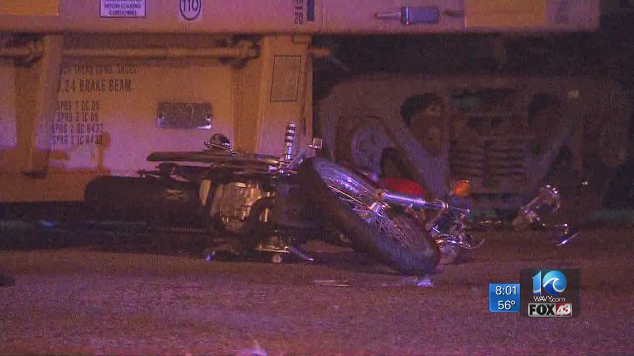 Motorcyclist seriously hurt after crash with train - YouTube