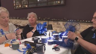 Euclid Businesses Display Blue Ribbons For Police Officer Jacob Derbin