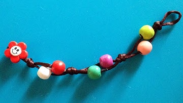 How To Make A Bead Bracelet With Simple Knots - DIY Style Tutorial - Guidecentral