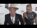 GIGI HADID and CODY SIMPSON attend Elton John Oscar