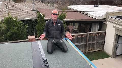 Denver Roofer install peel and stick or self adhered modified roof. Patio flat roof.
