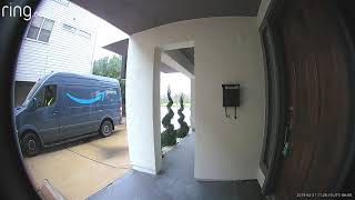 Amazon delivery driver throwing package out the window