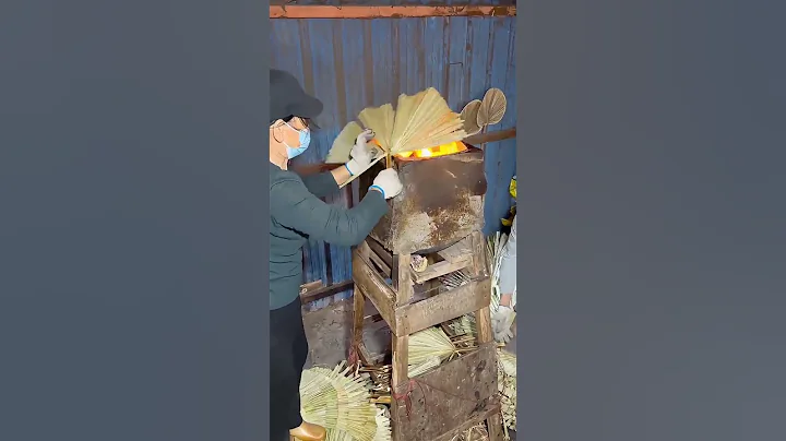 Traditional chinese palm-leaf fan making.