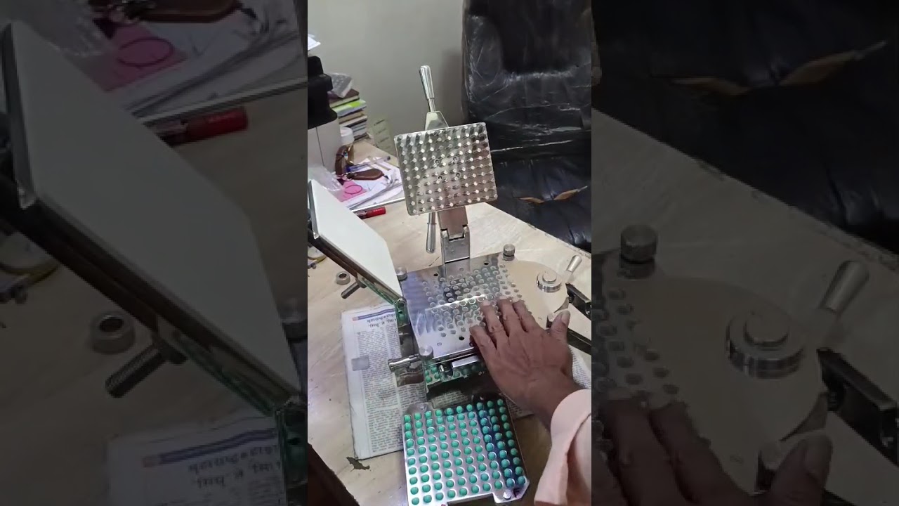 100 hole manual capsule filling machine. Producing 2000 capsules per hour.