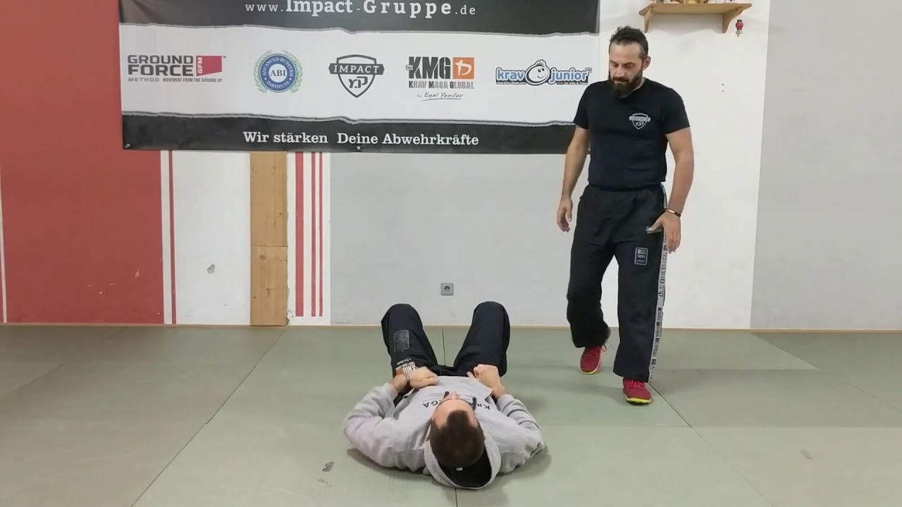 Krav Maga training- defending a choke on the ground in less than a minute