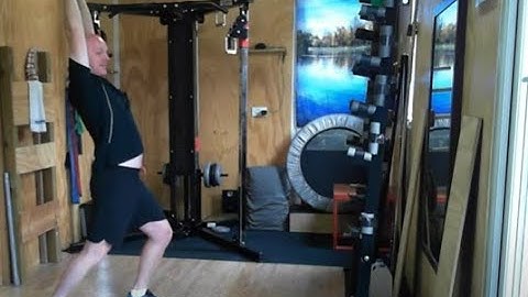 Dynamic Stretch, Posterior Step with Overhead Reach