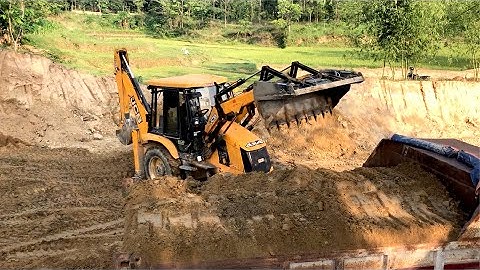 JCB & TRIPPER VIDEO, JCB Backhoe 3DX Machine Loading Soil Into Tipper