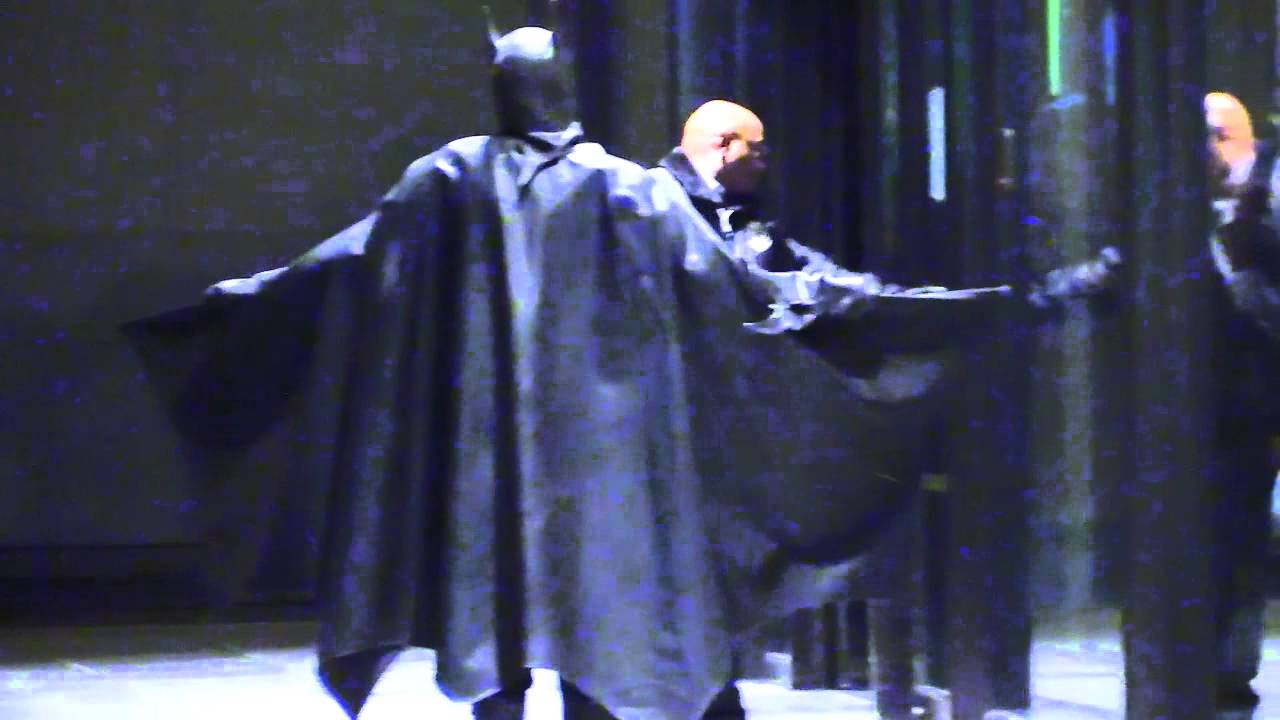 please cartoon BATMAN VS SECURITY