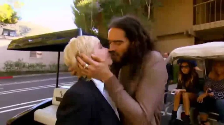 Russell Brand Kisses Reporter and Tries To Undo He...