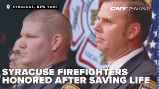 Two Syracuse firefighters honored for saving man's life in Northside house fire last year