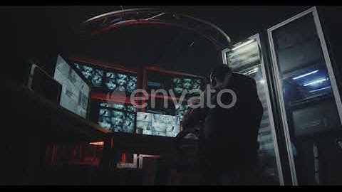 Hacker Watching Security Camera Footage | Stock Footage - Envato elements