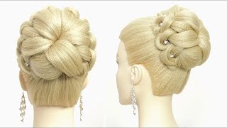 High bun hairstyle for long hair. Wedding prom updo