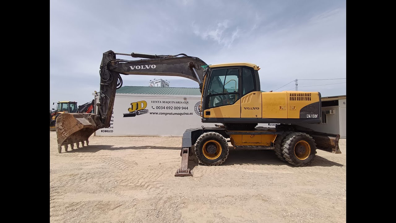 VOLVO EW180C EN FUNCIONAMIENTO