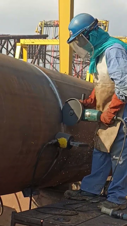 Indian grinder hard working in construction
