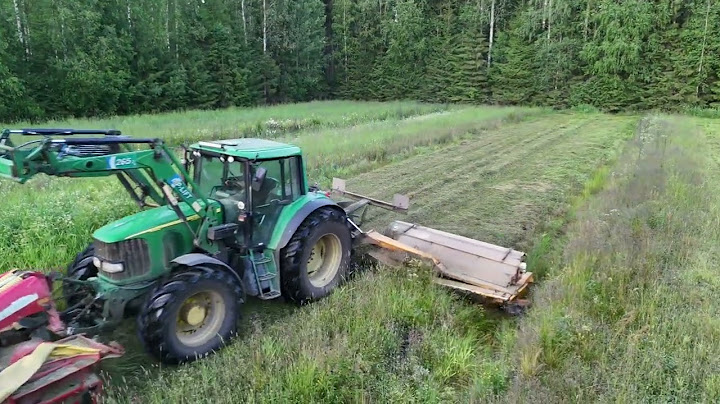 Kuivanheinän tekoa pienpaaliin  Pienen suopellon niittoa isolla perhosniittokoneella