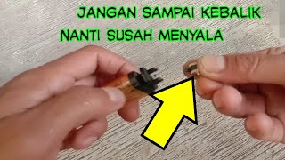 cara melepas dan memasang batu korek gas