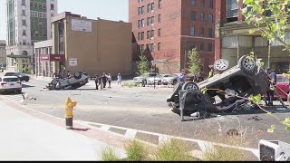 Two vehicle crash causes vehicles to be flipped over on their roof in Wheeling