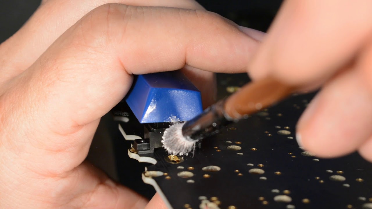 Testing whether stabilizer sliders hit the PCB when the keycap bottoms out