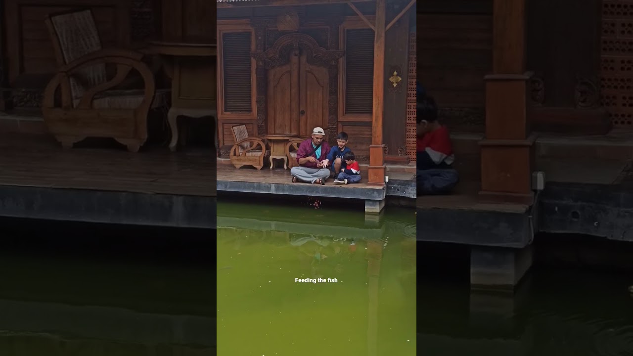 feeding the fish @ BI Coffee Bintaro, South Tangerang, Indonesia