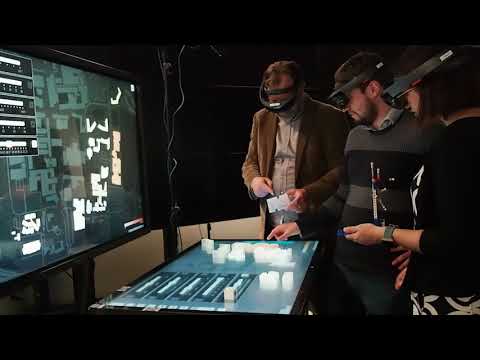 Uplift: A Tangible and Immersive Tabletop System for Casual Collaborative Visual Analytics