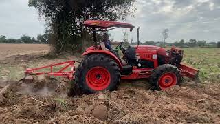 KUBOTA M7508 in pristine condition, fitted with a 3-blade tiller, preparing the soil for sugarcan...