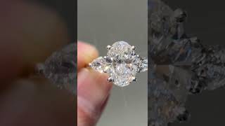 3 Carat Oval Diamond Ring with Pear Side Stones 18K Yellow Gold &amp; Platinum Prongs | Mike Nekta NYC