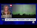 Solar storm triggers light show
