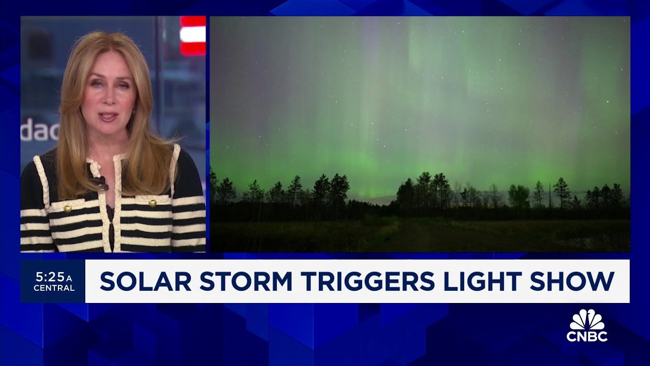 Solar storm triggers light show - YouTube