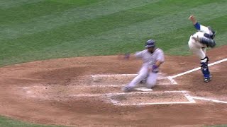 COL@SEA: Rosario and Morneau score on an error in 4th