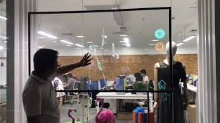 Transparent screen display showcase with interactive function