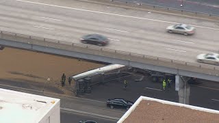 Raw: Overturned semi spills soybeans on I-64