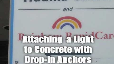 Sign Fastened to Concrete Using Hilti Drop-in Anchors