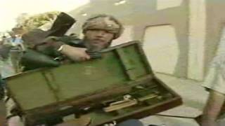 Rebels, civilians loot Gadhafi compound