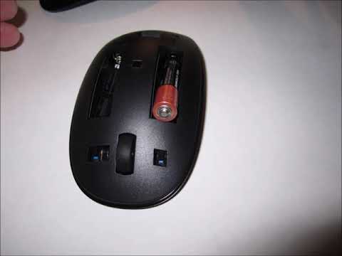 How to put in or change batteries in an HP wireless mouse