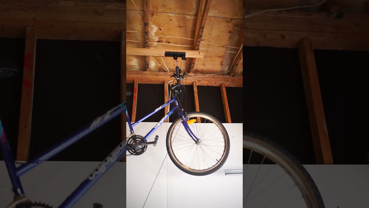 Bike hoist in a garage with high ceiling