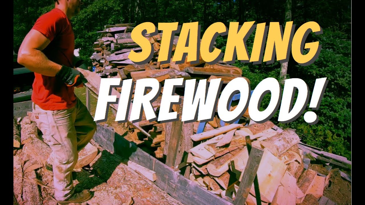 STACKING A TRAILER LOAD OF FIREWOOD! - YouTube
