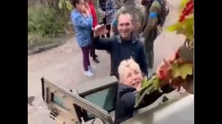 People Greeting Ukrainian Soldiers in Liberated Villages.