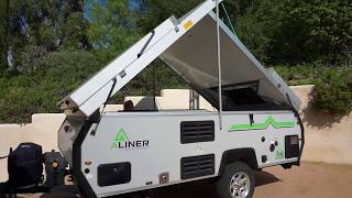Raising the roof on the Aliner LXE with wind poles SOLO