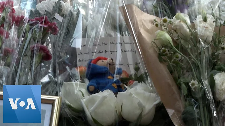 Crowds Queue as Hong Kongers Mourn Queen Elizabeth...