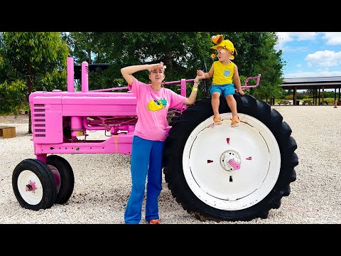 Chris and Mom learn how to harvest strawberries and vegetables at the farm