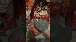 Shark puppet Cheetos Popcorn Cheddar Flamin' Hot