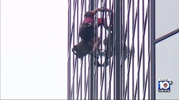 Window washer rescued from high-rise after equipment malfunctions