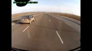 Алматы. Камри разворачивается через двойную сплошную 20150226 0846
