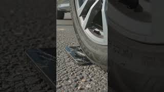 A car is crusing a i phone 16 pro max #trending #video #flagshipphone #car